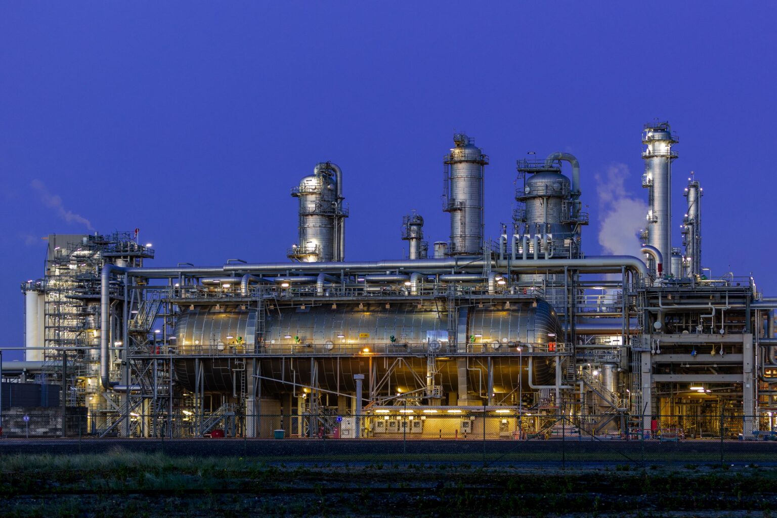 Natural gas processing and syngas plant illuminated at night